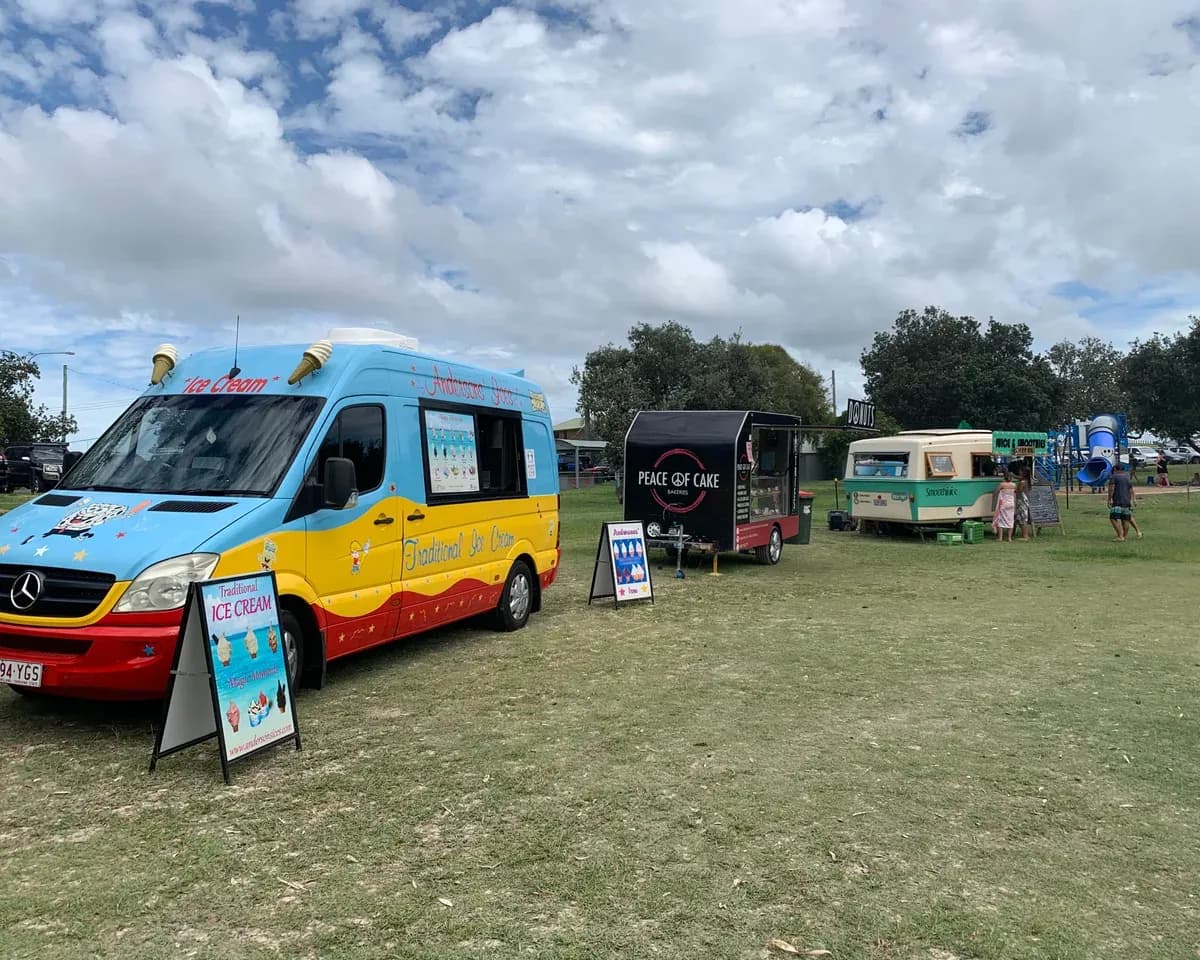 The Andersons' Ices van trading beside other food trucks at a Gold Coast community market