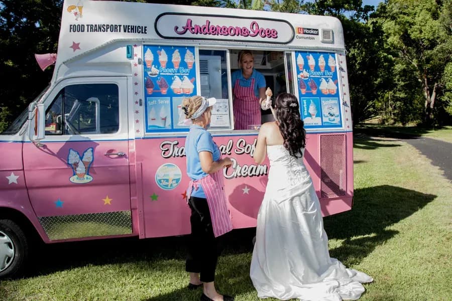 Sammy serving soft serve cones from the Andersons' Ices van at a Gold Coast wedding in 2014